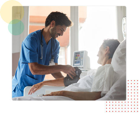 Nurse with patient in hospital room