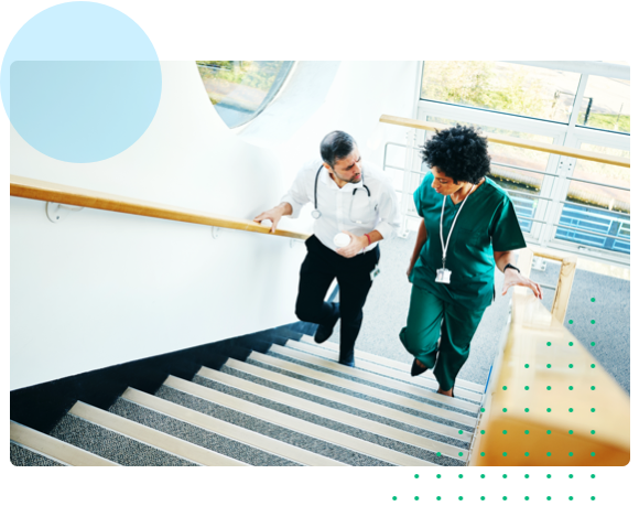 Healthcare workers walking up steps