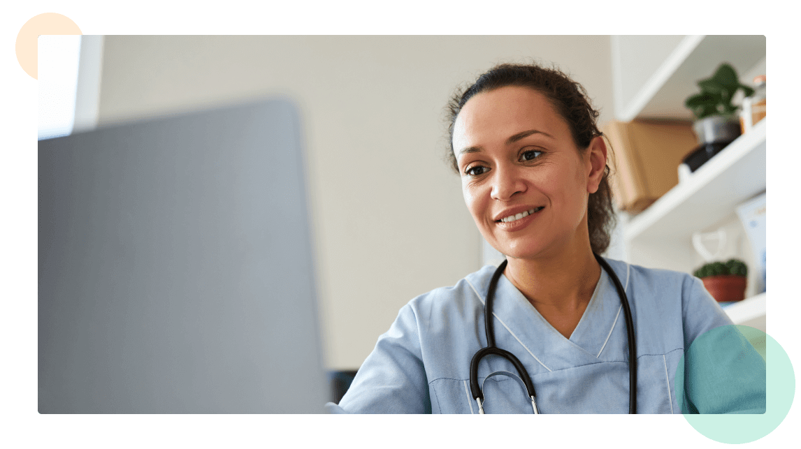 Nurse gazing at computer monitor