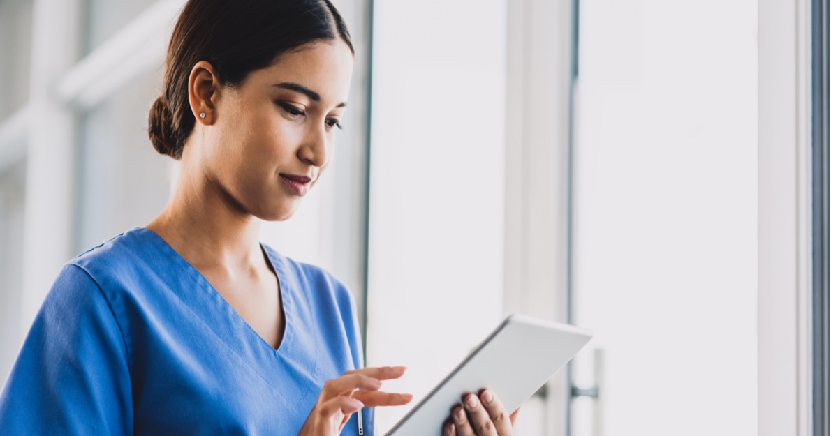 Clinical Dashboard Woman on a Tablet