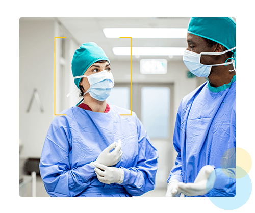 Docttors in clinical setting with masks - HealthStream