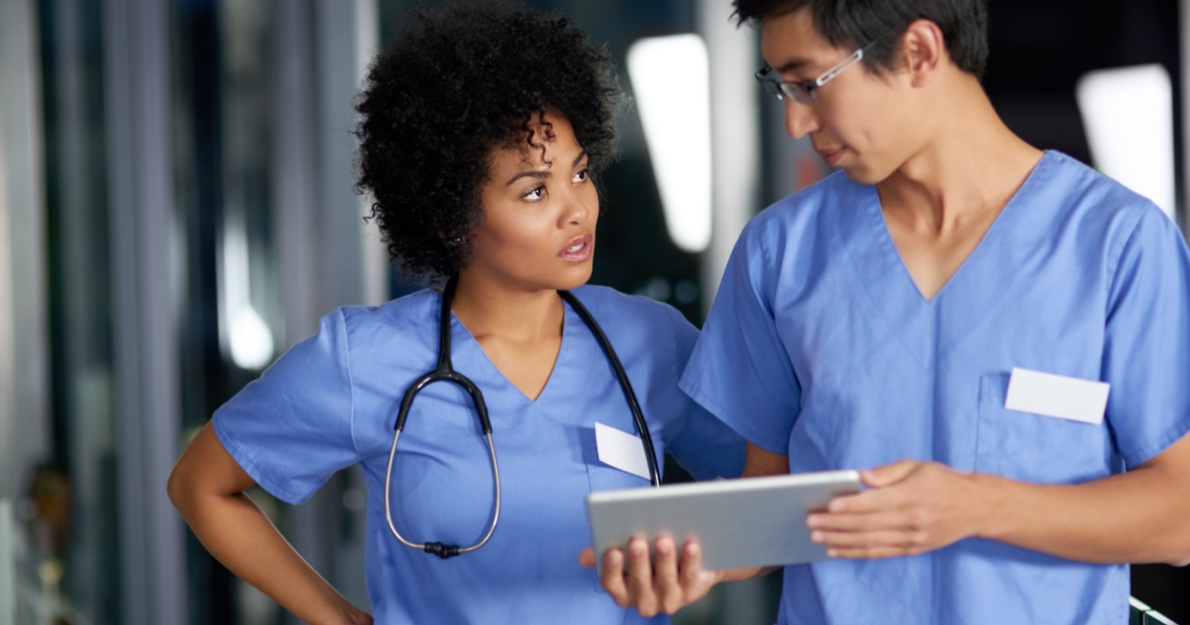 Two medical professionals talking