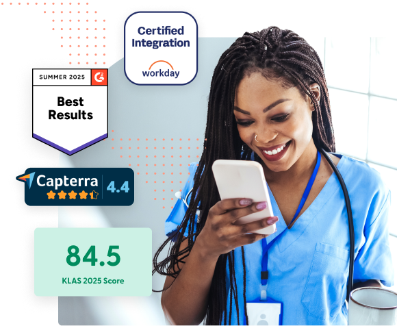 Nurse using smart phone smiling