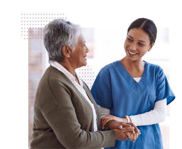 Older Woman with female nurse guidance-min