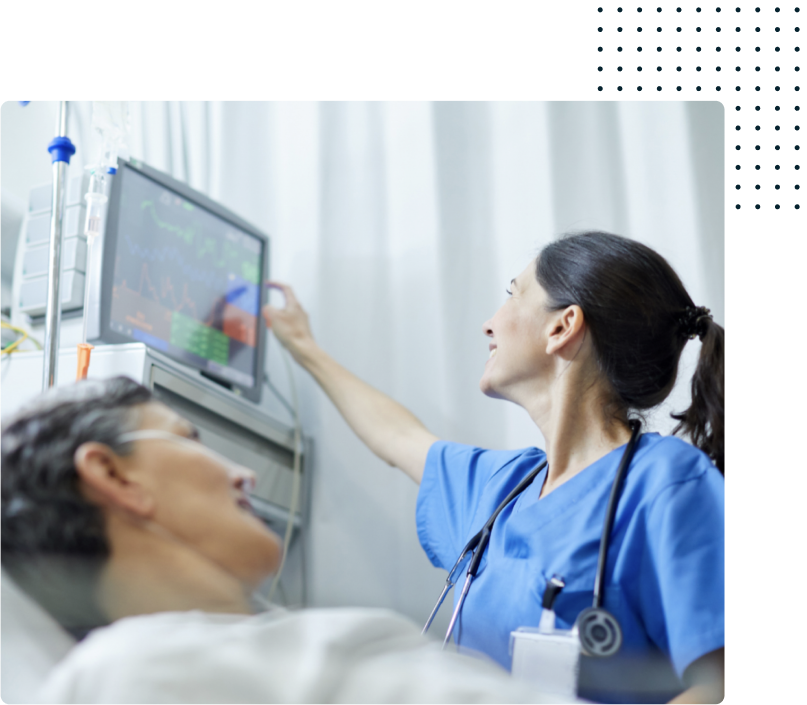 Smiling nurse at hospital bed - HealthStream