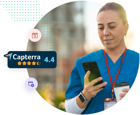 Women nurse on smart phone smiling
